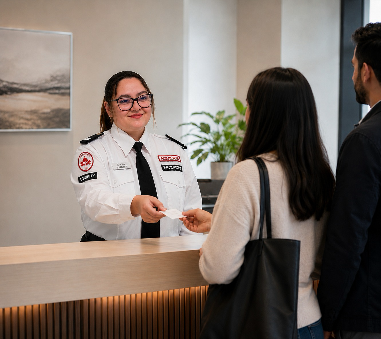 Aquilius concierge officer assisting a resident